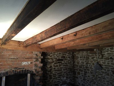 Timber beam partway through cleaning process