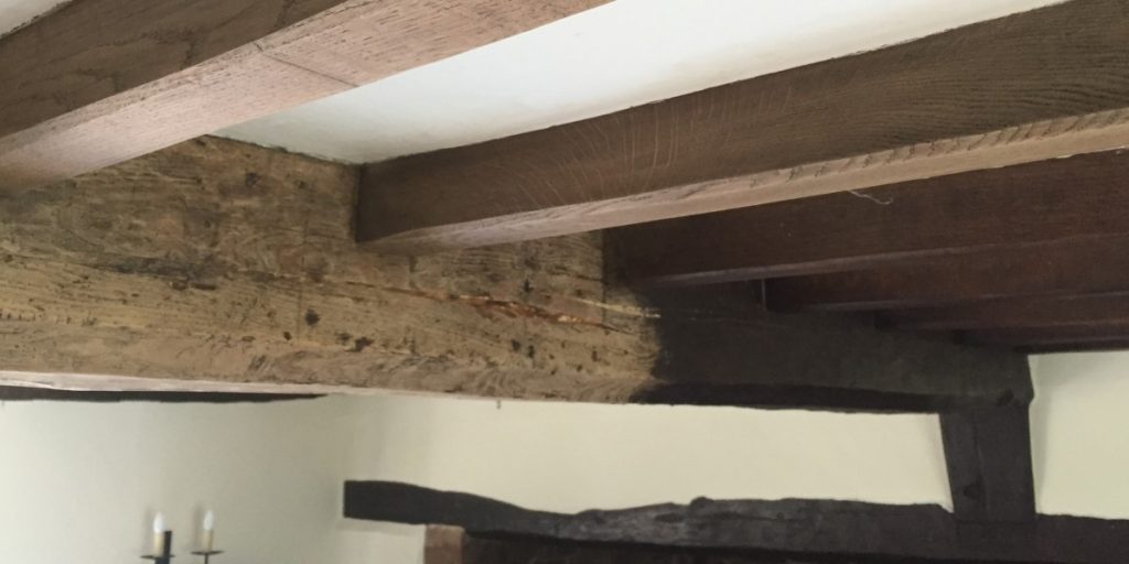 Timber beam partway through cleaning process