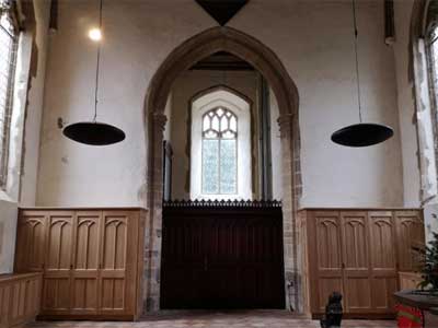 View inside Bardwell church of Restored Window and joinery